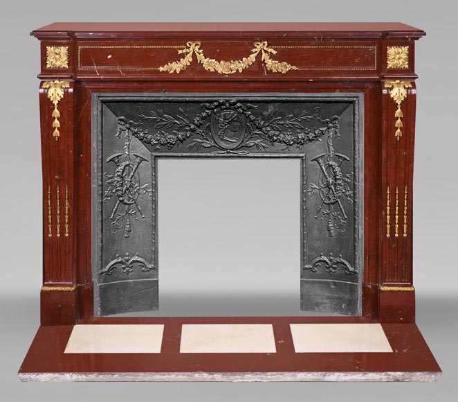 Louis XVI style fireplace in Antique Red marble, with bronze mounts, decorated with a garland-0