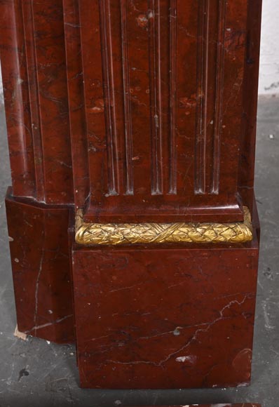 Louis XVI style fireplace in Antique Red marble, with bronze mounts, decorated with a garland-11