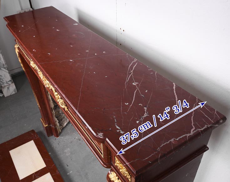 Louis XVI style fireplace in Antique Red marble, with bronze mounts, decorated with a garland-13