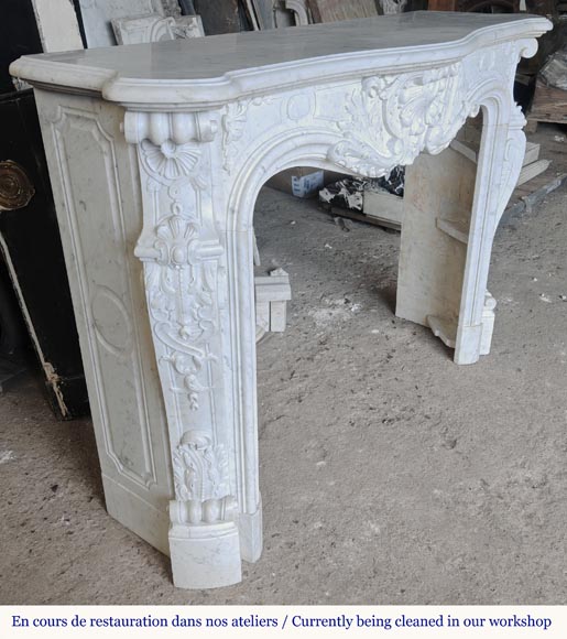 Louis XV style fireplace, highly sculpted in Carrara marble, from northern France-4