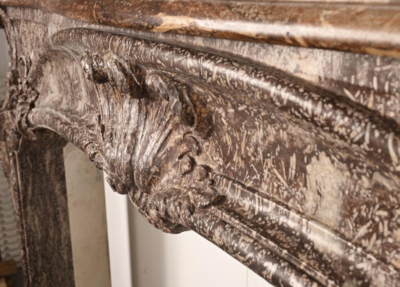 Louis XV period fireplace decorated with an asymmetrical palmette in a variation of Royal Red marble-6