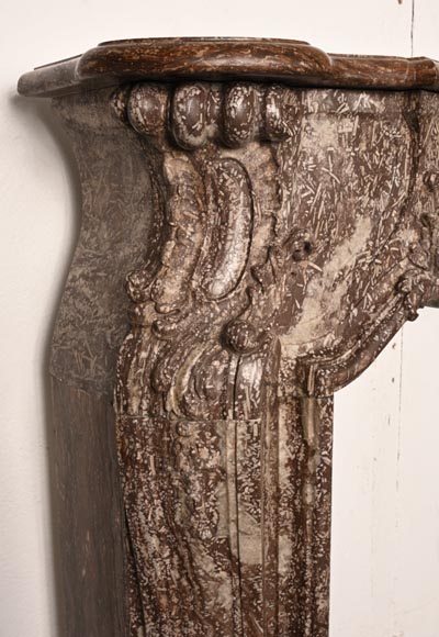 Louis XV period fireplace decorated with an asymmetrical palmette in a variation of Royal Red marble-8