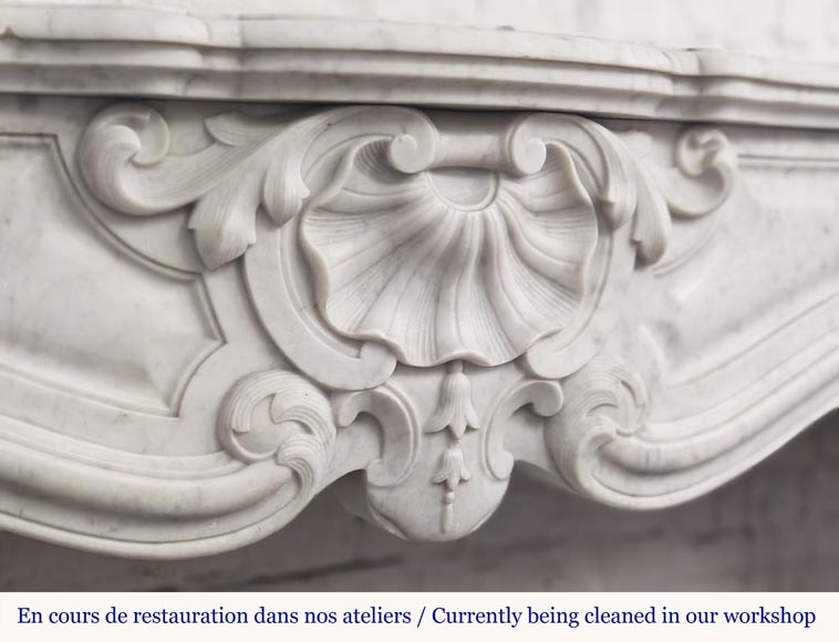 Large Louis XV style fireplace in Carrara marble decorated with shells and flowers-1
