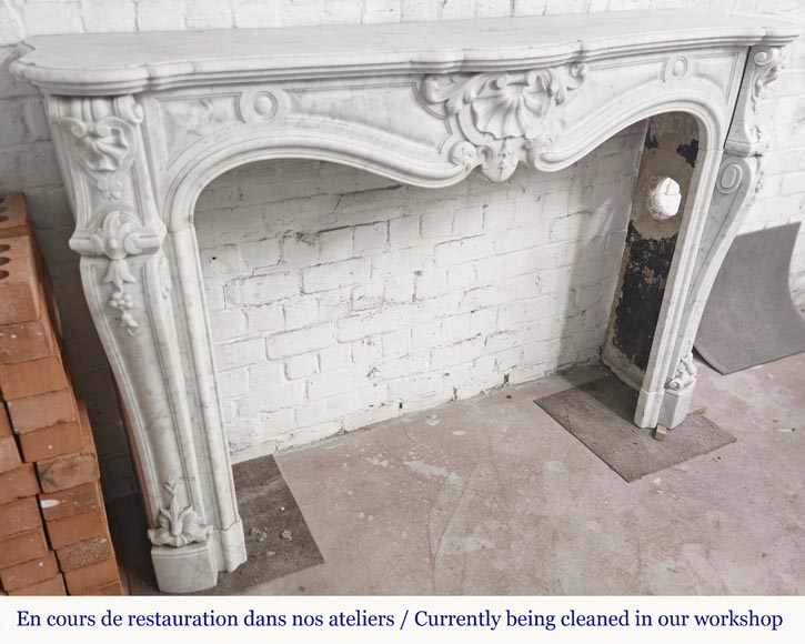 Large Louis XV style fireplace in Carrara marble decorated with shells and flowers-2