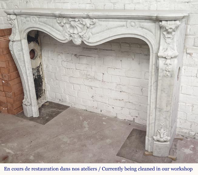 Large Louis XV style fireplace in Carrara marble decorated with shells and flowers-5