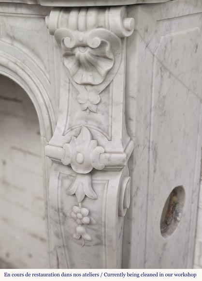 Large Louis XV style fireplace in Carrara marble decorated with shells and flowers-7