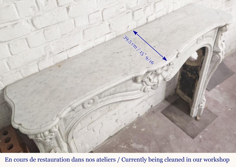 Large Louis XV style fireplace in Carrara marble decorated with shells and flowers-9