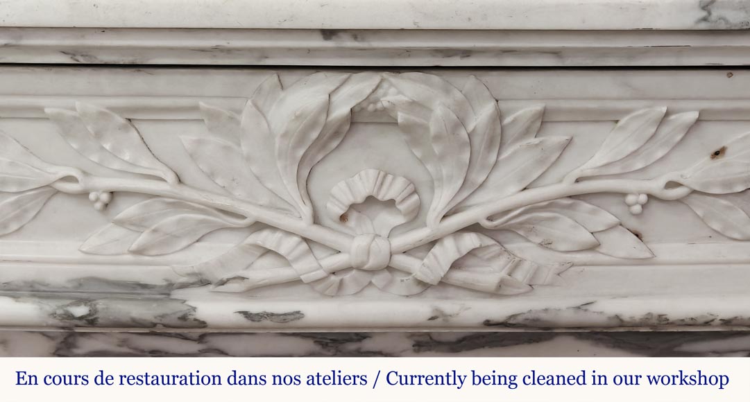 Curved Louis XVI style fireplace in Arabescato marble, decorated with a laurel wreath-1