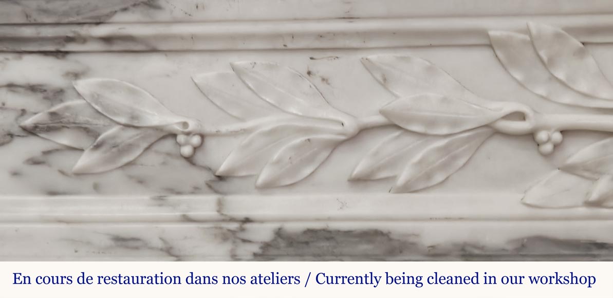 Curved Louis XVI style fireplace in Arabescato marble, decorated with a laurel wreath-3