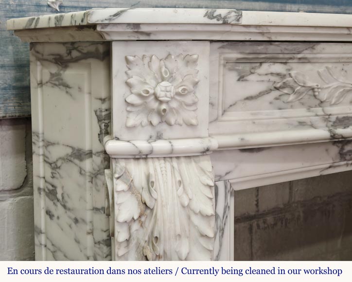 Curved Louis XVI style fireplace in Arabescato marble, decorated with a laurel wreath-6