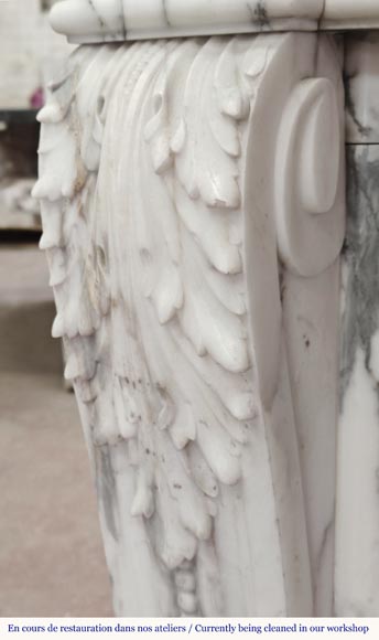 Curved Louis XVI style fireplace in Arabescato marble, decorated with a laurel wreath-7