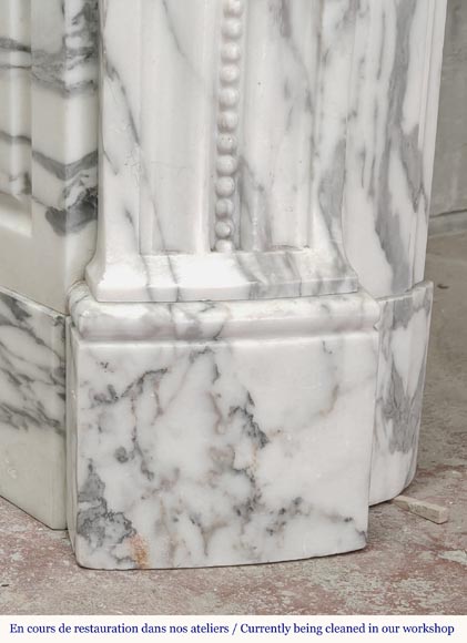 Curved Louis XVI style fireplace in Arabescato marble, decorated with a laurel wreath-8