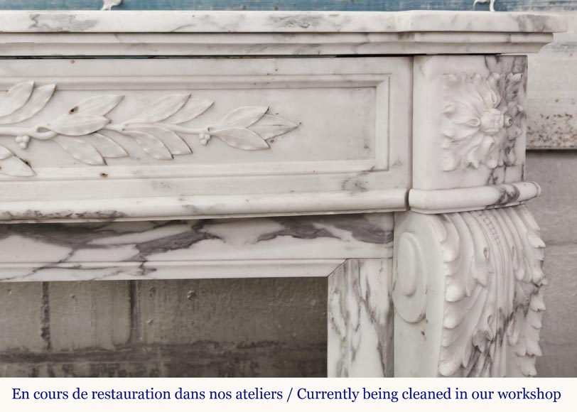Curved Louis XVI style fireplace in Arabescato marble, decorated with a laurel wreath-10
