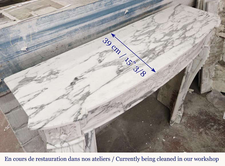 Curved Louis XVI style fireplace in Arabescato marble, decorated with a laurel wreath-12