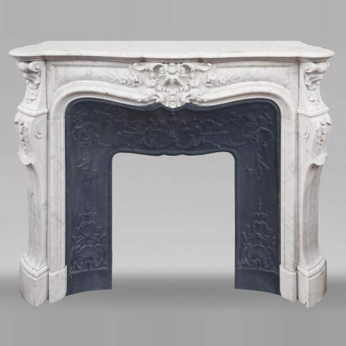 Louis XV style fireplace in finely carved Carrara marble