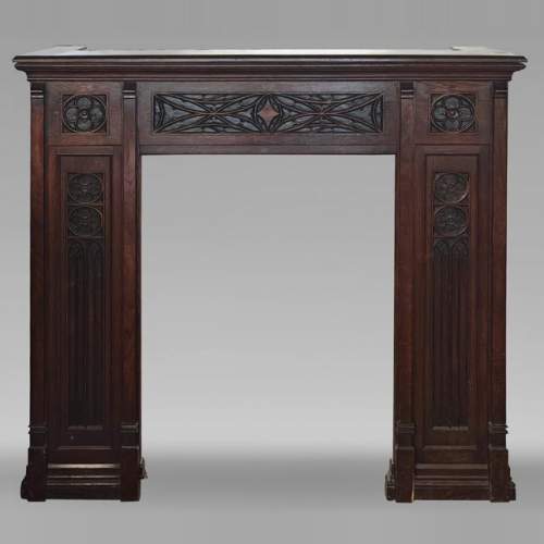  Neo-Gothic style fireplace with napkin fold decoration, in oak wood