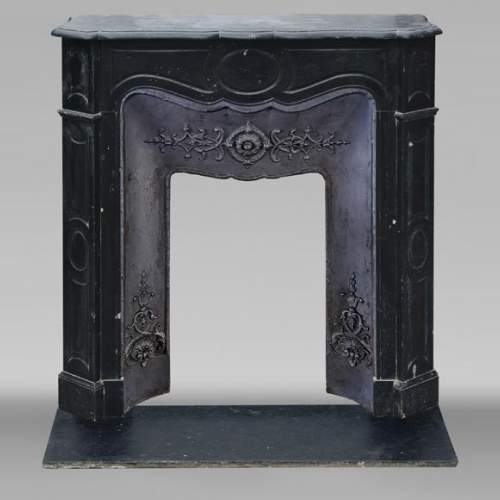 Small Louis XV style fireplace, Pompadour model, in speckled black marble