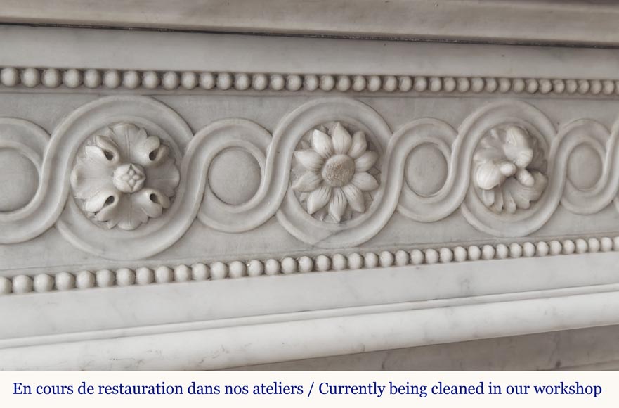 Louis XVI style fireplace in Carrara marble, decorated with pearls and macaroons-2