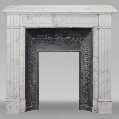 Louis XVI style molded fireplace, in Arabescato marble