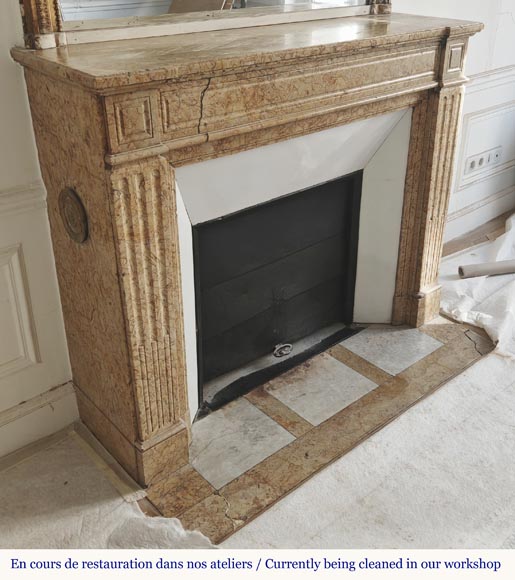 Louis XVI style fireplace with molded decoration, in yellow marble-2