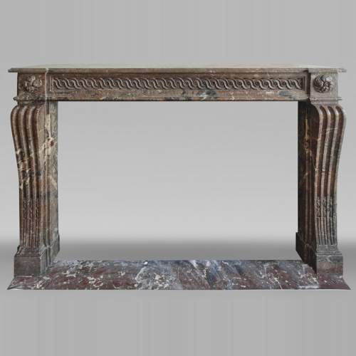 Louis XVI period fireplace, sculpted in Rouge Royal, decorated with a vitruvian frieze