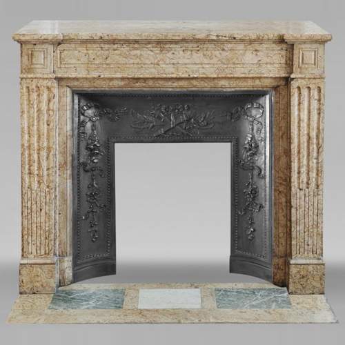  Louis XVI style molded fireplace, in yellow marble