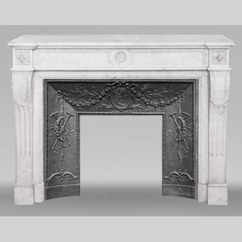  Louis XVI style fireplace with a central sunflower, in Carrara marble