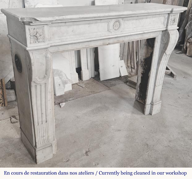  Louis XVI style fireplace with a central sunflower, in Carrara marble-2