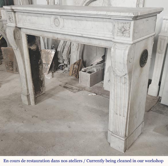  Louis XVI style fireplace with a central sunflower, in Carrara marble-5