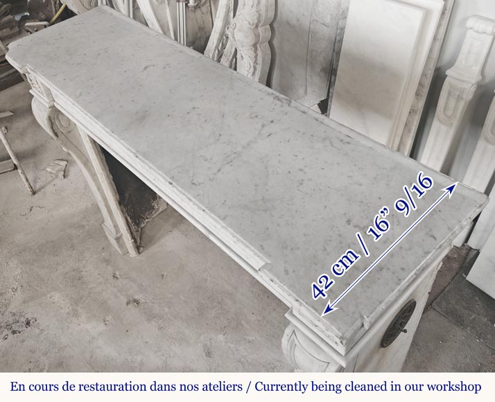  Louis XVI style fireplace with a central sunflower, in Carrara marble-8