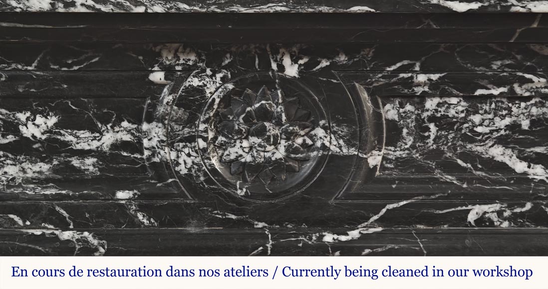 Louis XVI style fireplace decorated with a flower, in black Marquina marble-1