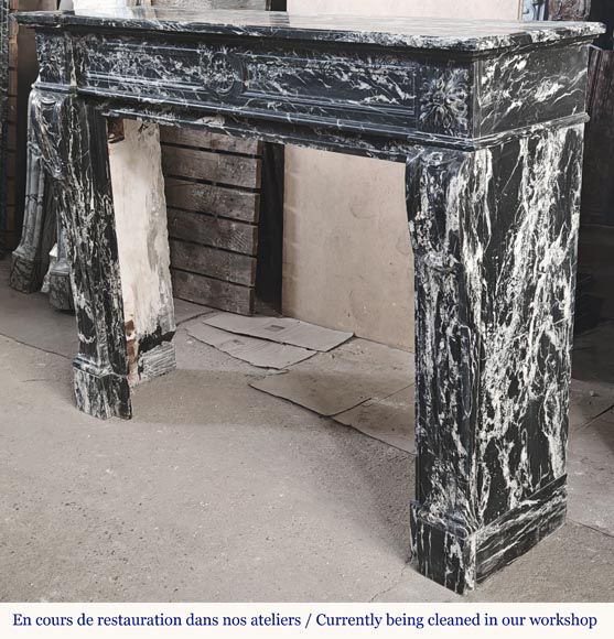 Louis XVI style fireplace decorated with a flower, in black Marquina marble-6