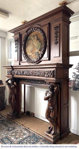 Monumental carved walnut fireplace with atlantes and painted medallion-8