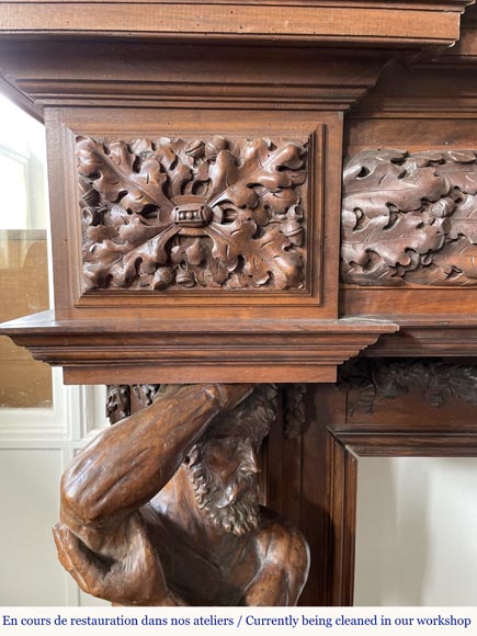 Monumental carved walnut fireplace with atlantes and painted medallion-9