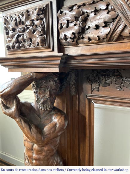 Monumental carved walnut fireplace with atlantes and painted medallion-11