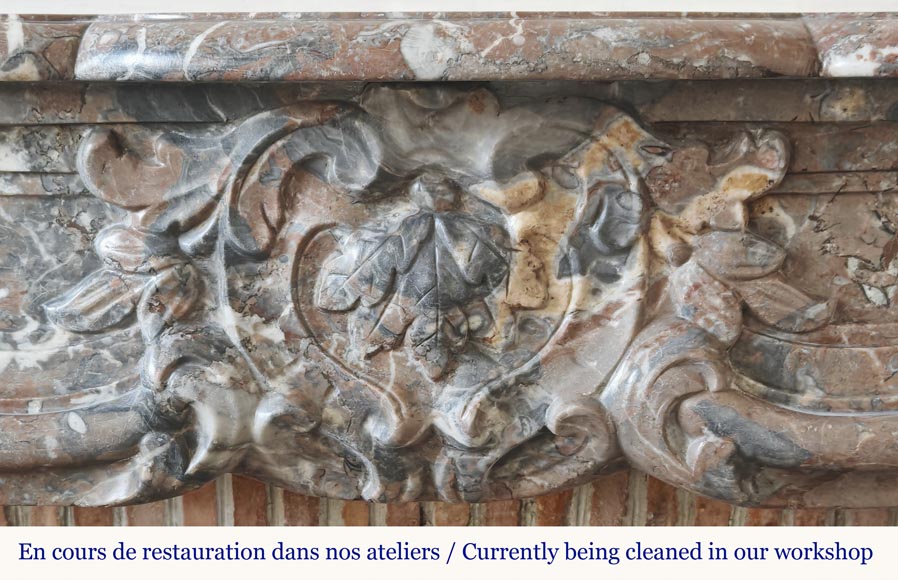 Louis XV period fireplace in Rouge Royal marble, decorated with a shell-1