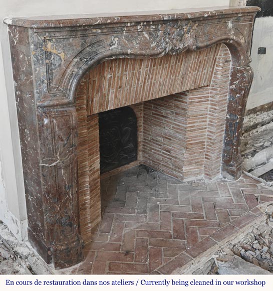 Louis XV period fireplace in Rouge Royal marble, decorated with a shell-2