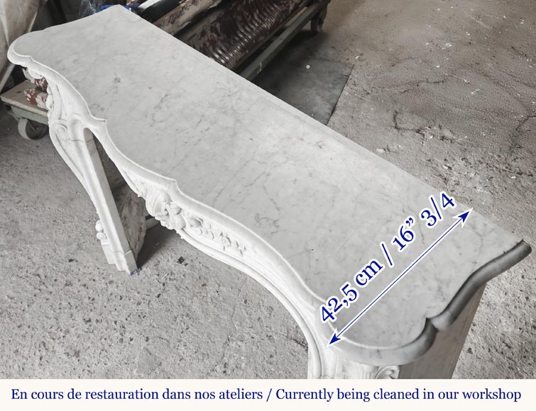 Louis XV style fireplace in Carrara marble richly carved with plant motifs-14