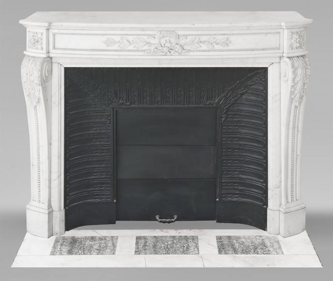 Curved Louis XVI style fireplace with beaded decoration, in semi-statuary marble.-0