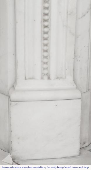 Curved Louis XVI style fireplace with beaded decoration, in semi-statuary marble.-7