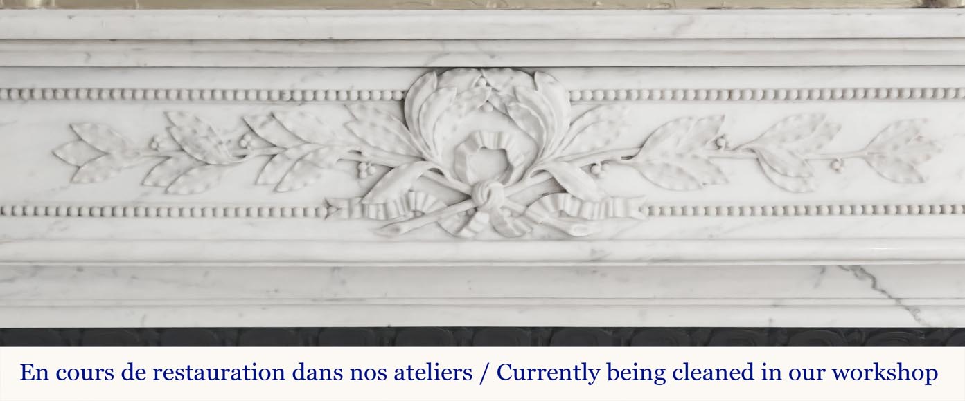 Curved Louis XVI style fireplace with beaded decoration, in semi-statuary marble.-1