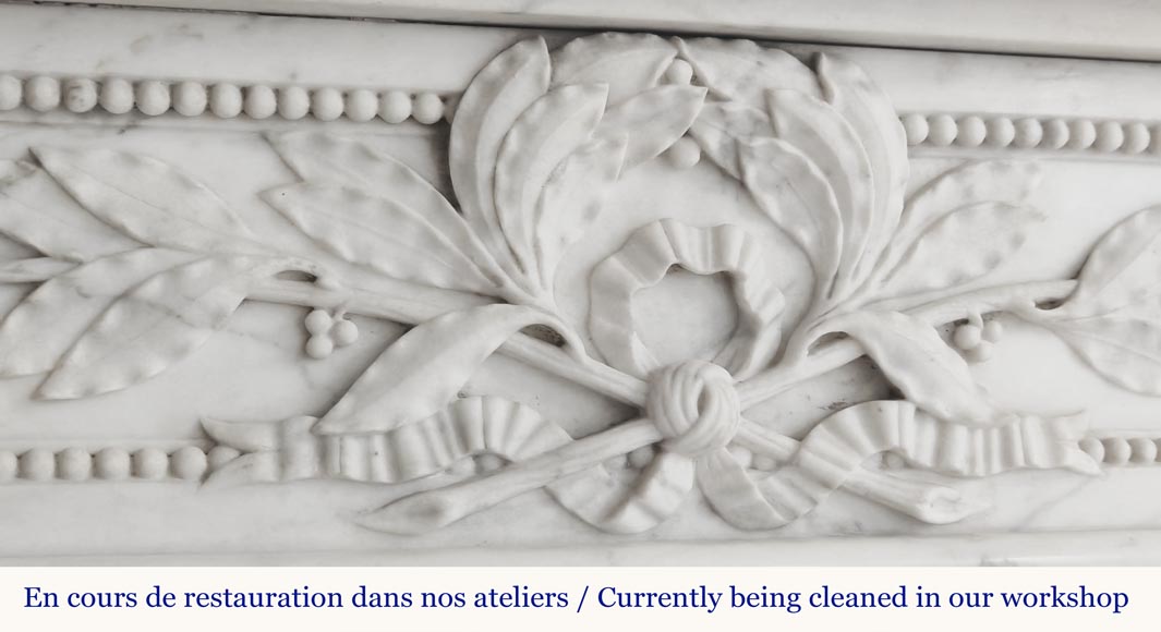 Curved Louis XVI style fireplace with beaded decoration, in semi-statuary marble.-2