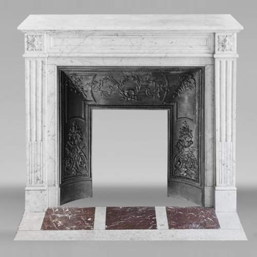 Louis XVI style fireplace with molded decoration, in Carrara marble
