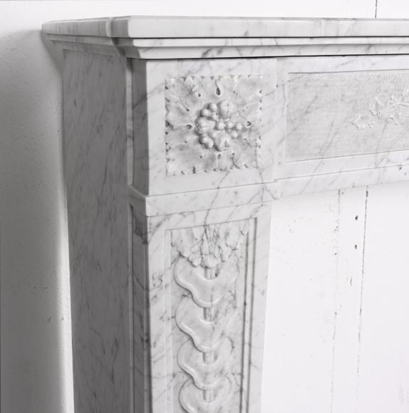 Louis XVI period fireplace with carved fruit decoration, in veined Carrara marble-6