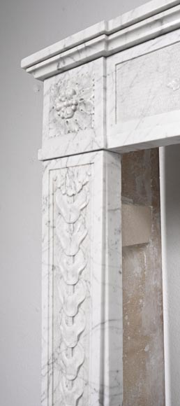 Louis XVI period fireplace with carved fruit decoration, in veined Carrara marble-7