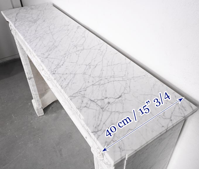 Louis XVI period fireplace with carved fruit decoration, in veined Carrara marble-13