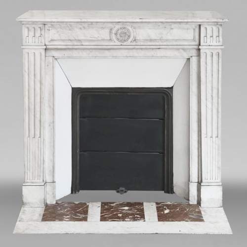 Louis XVI style fireplace adorned with a sunflower, in Carrara marble