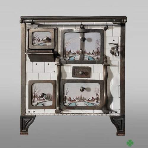 Cast-iron stove with faience imitation and snowy landscape decoration