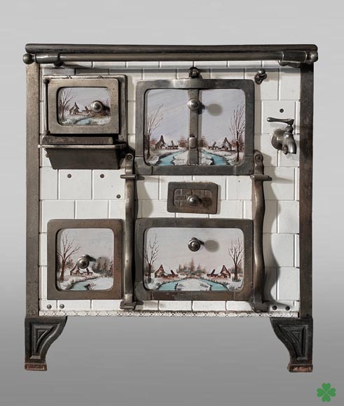 Cast-iron stove with faience imitation and snowy landscape decoration-0