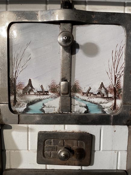 Cast-iron stove with faience imitation and snowy landscape decoration-3